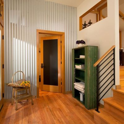 Interior design of an entryway using metal siding