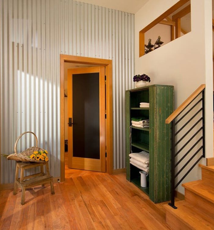 Interior design of an entryway using metal siding